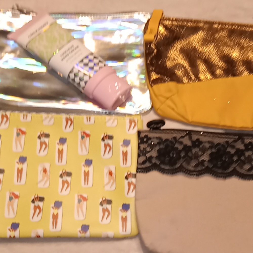 4 IPSY bags NEW & 2oz Hand Cream